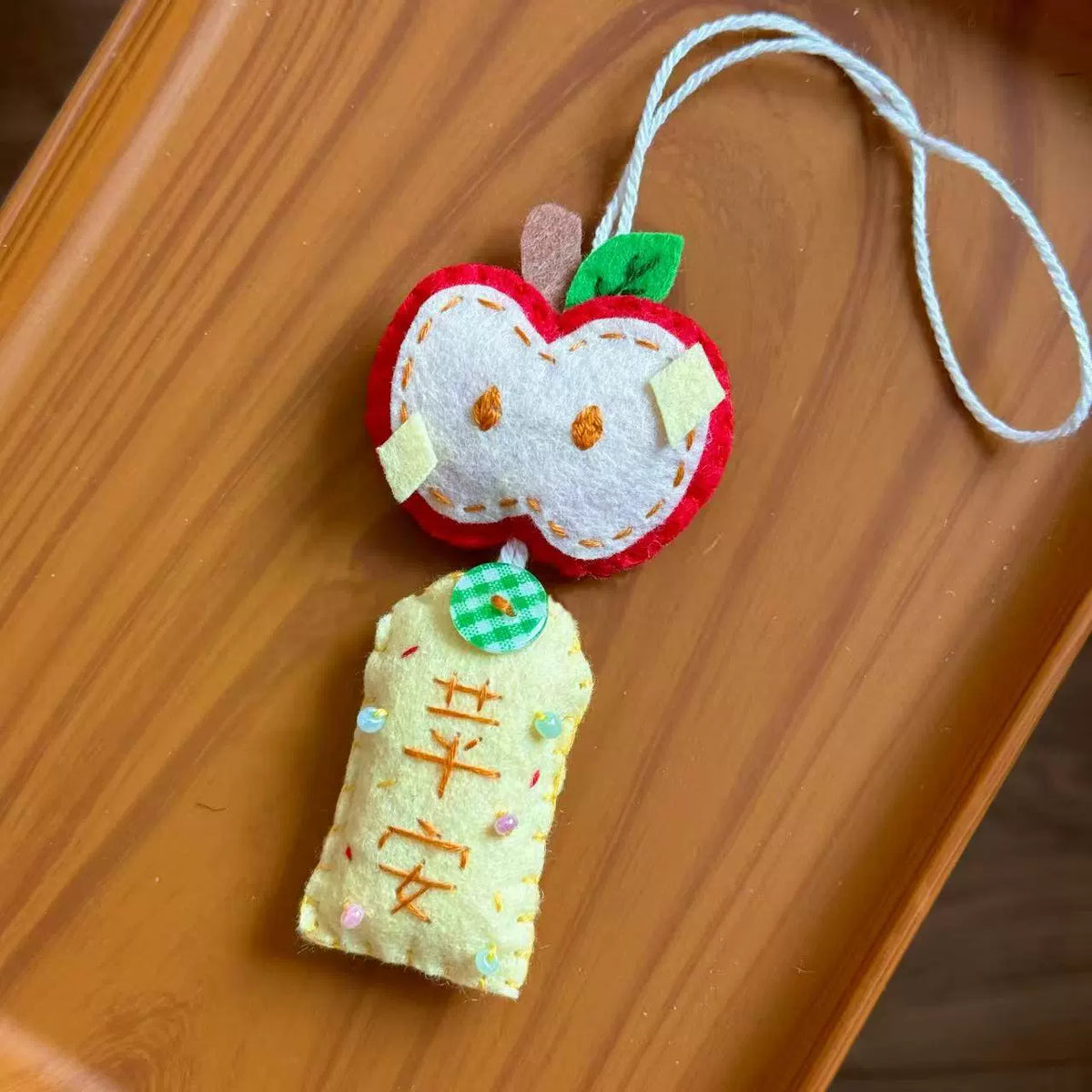 apple 'peace and safety' pendant keychain