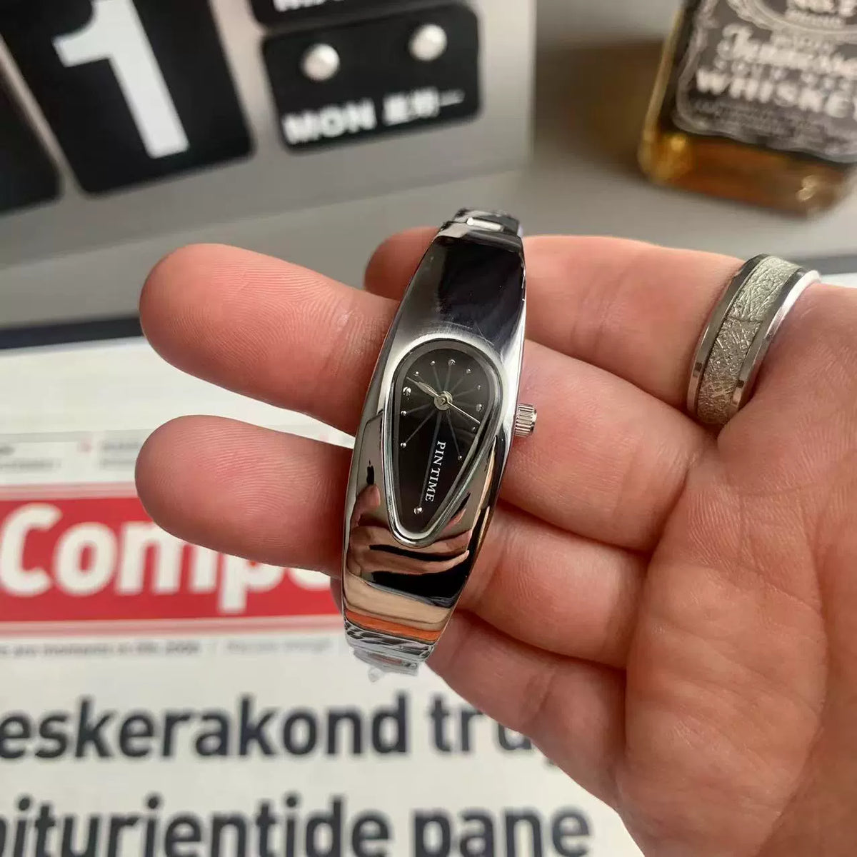 teardrop analog watch