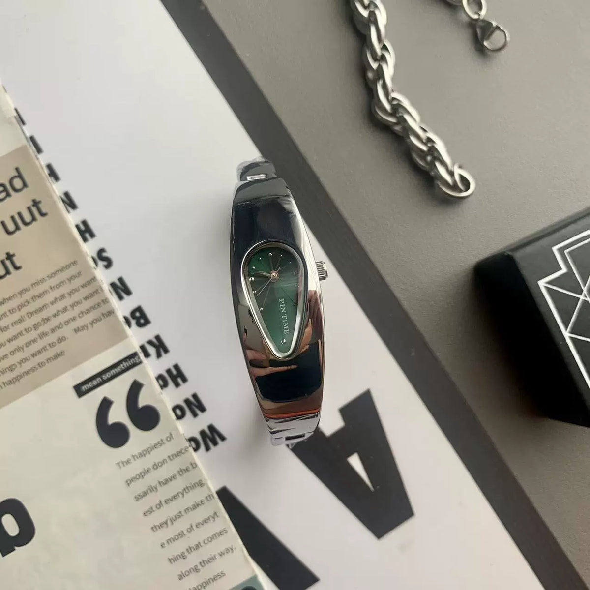 teardrop analog watch