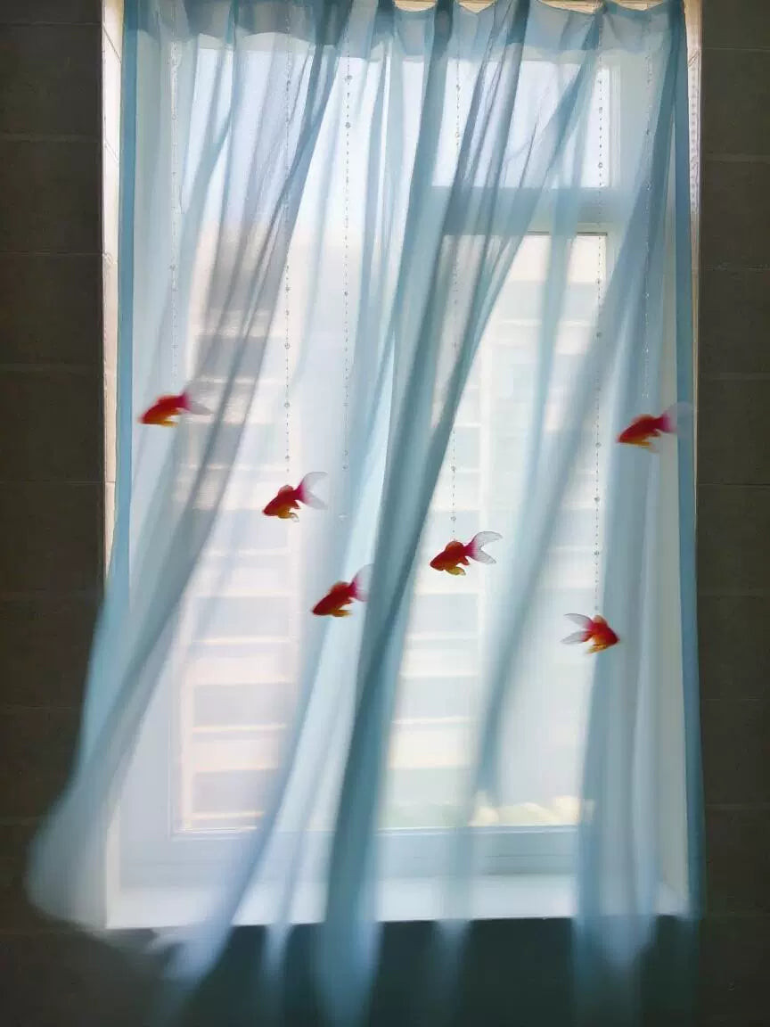 swimming goldfish curtain
