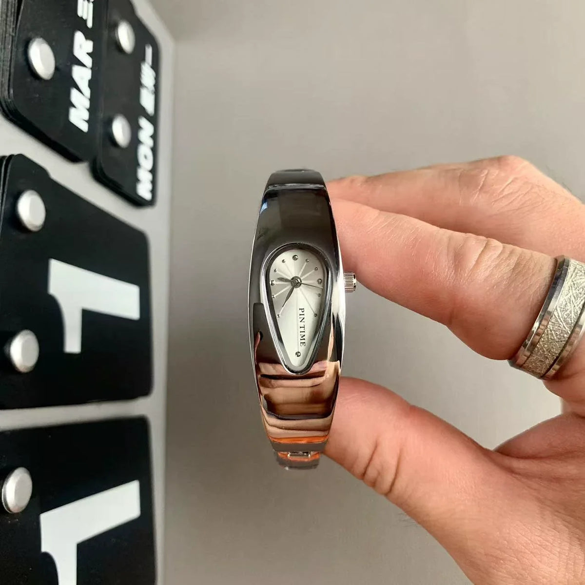 teardrop analog watch