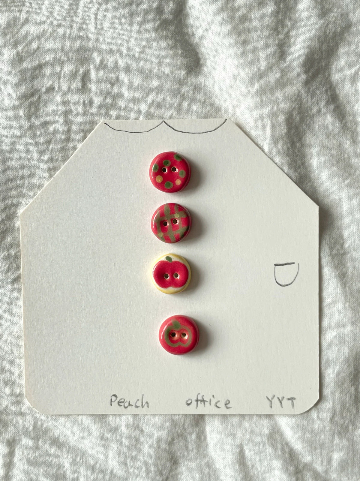 red apple buttons