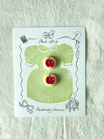 red apple buttons