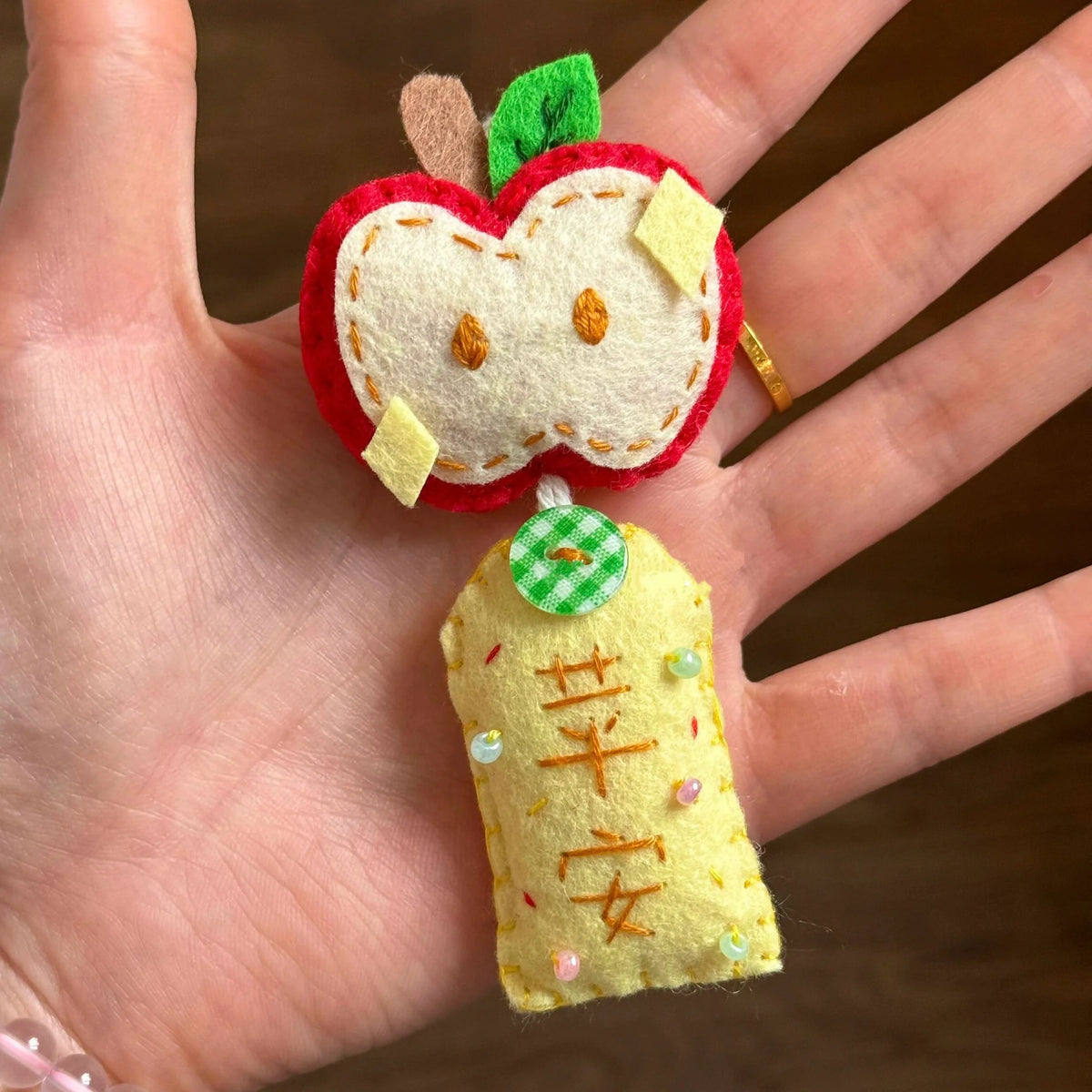 apple 'peace and safety' pendant keychain