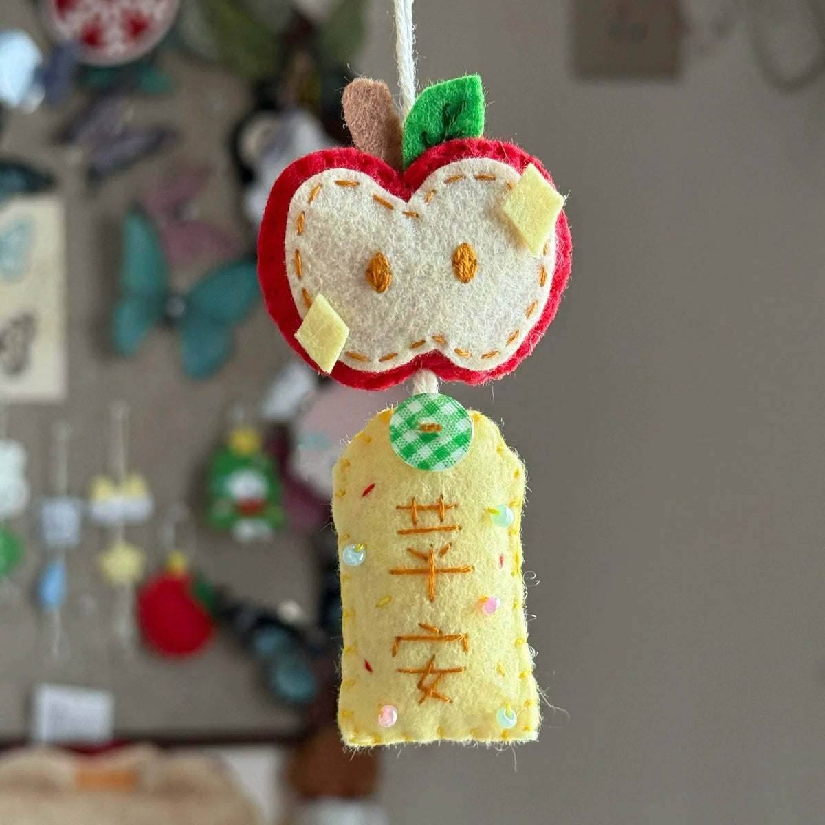 apple 'peace and safety' pendant keychain