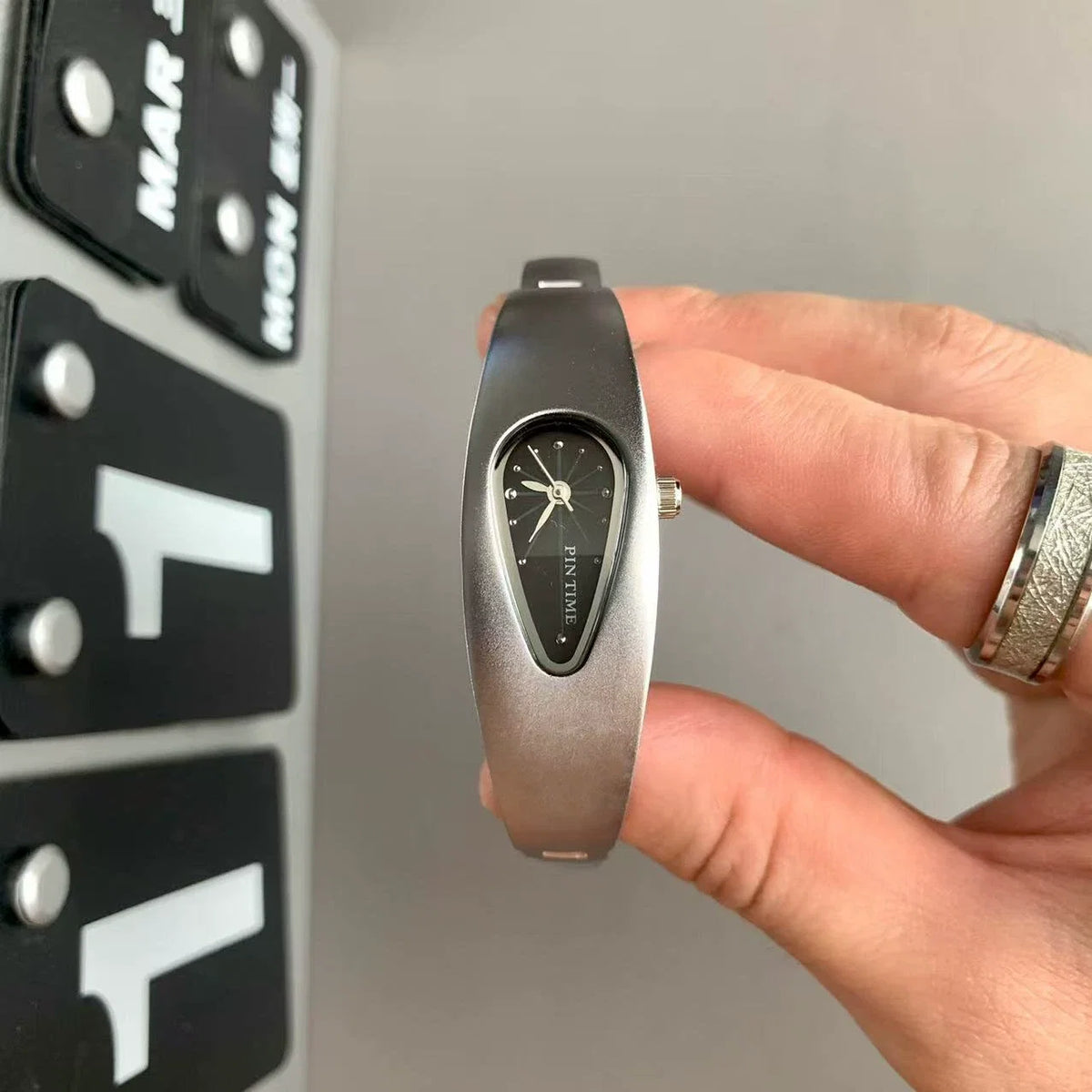 teardrop analog watch