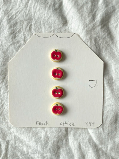 red apple buttons