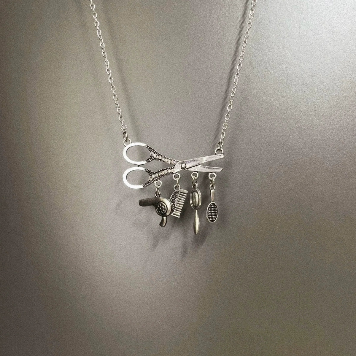 silver hair salon necklace