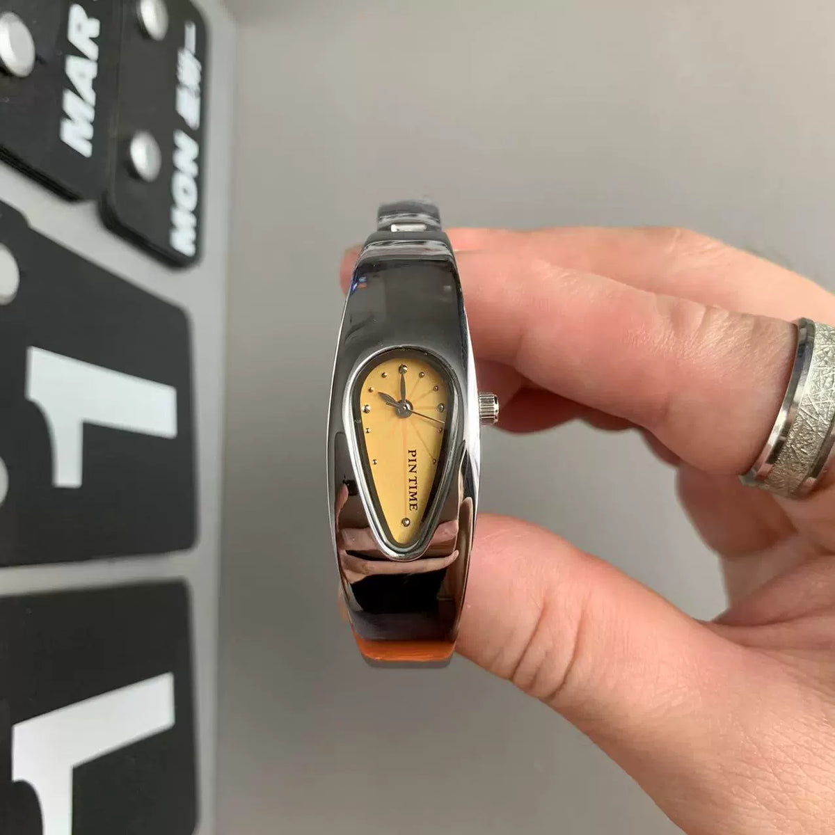 teardrop analog watch